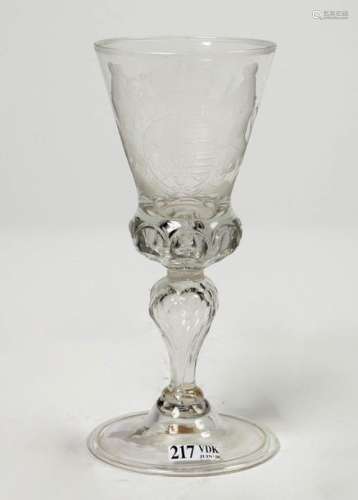 Large translucent glass decorated with the coat of…