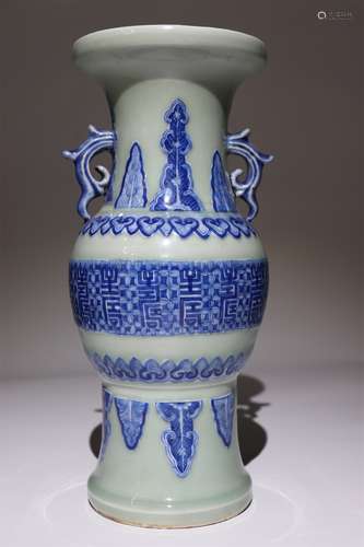 Double ear vase decorated with pea green glaze and blue and white pattern