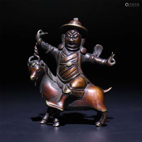Bronze God of riding sheep and protecting Dharma