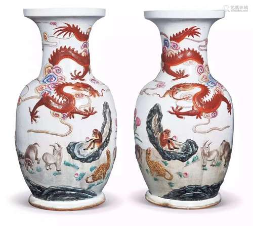 A pair of large bottles with dragon pattern and mouth