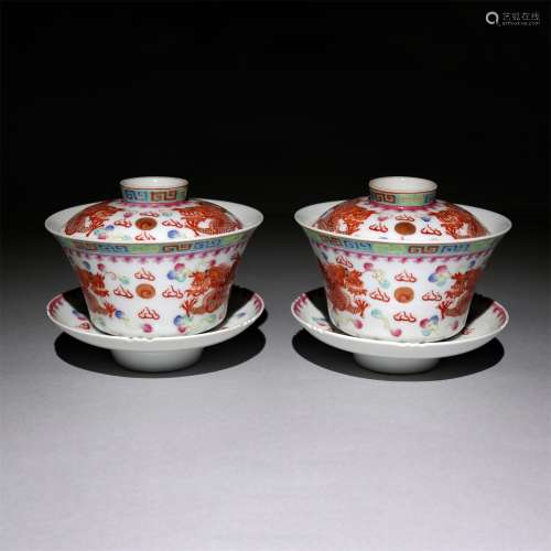 A pair of bowls with alum red powder and colored glaze