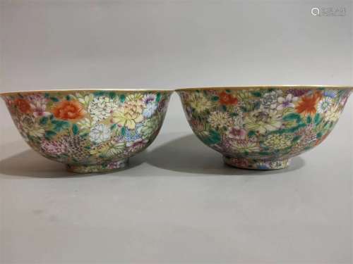 A pair of bowls with colorful flowers