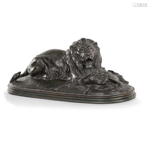 ANTOINE LOUIS BARYE (1795 1875 )LION HOLDING A GUI…