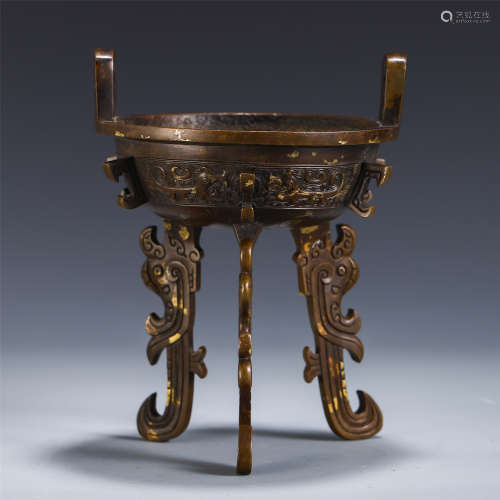 A CHINESE DOUBLE HANDLE BRONZE BEAST TRIPLE FEET CENSER