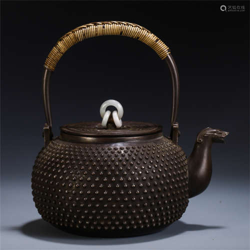 A CHINESE BEAST MOUTH LONG HANDLE SILVER KETTLE