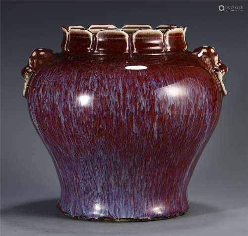 A CHINESE PORCELAIN WARE RED GLAZE DOUBLE HANDLE JAR