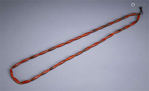 A CHINESE AGATE STRING