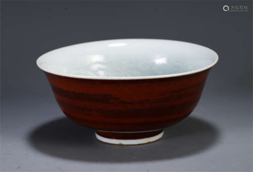 A CHINESE PORCELAIN RED UNDER GLAZE DRAGON PATTERN BOWL