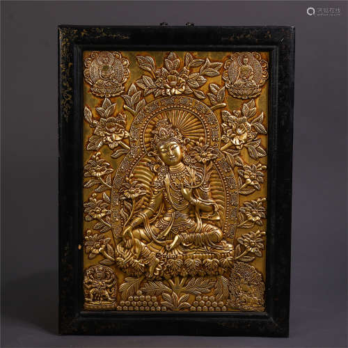 A CHINESE GILT BRONZE CARVED FLOWER AND SEATED BUDDHA PLAQUE