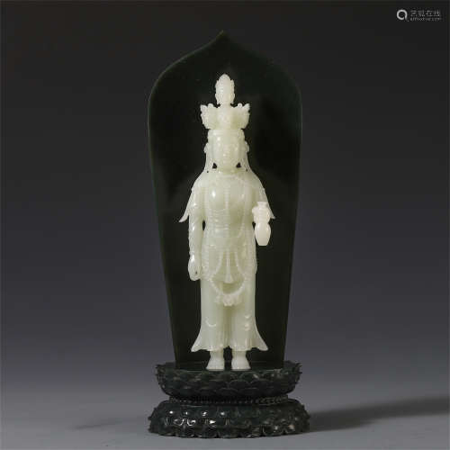 A CHINESE JADE GUANYIN STANDING STATUE IN SPINACH JADE NICHE