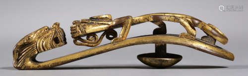 A GILT BRONZE HOOK CARVED WITH DRAGO