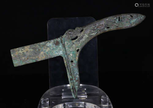 A BRONZE DAGGER CARVED WITH PATTERN