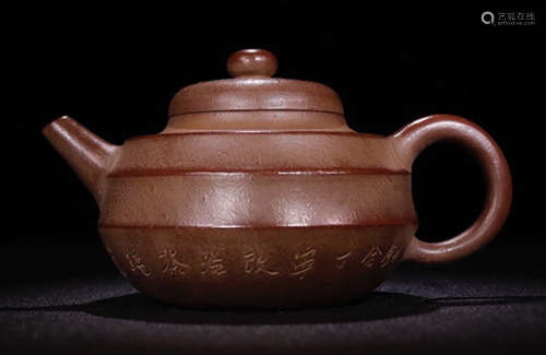 A ZISHA TEA POT CARVED WITH POETRY