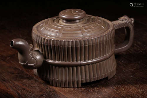 A ZISHA POT CARVED WITH PATTERN