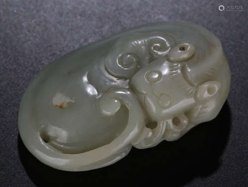 A HETIAN JADE CARVED BEAST