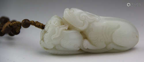 A HETIAN JADE CARVED BEAST