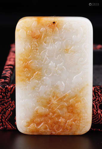 A HETIAN WHITE JADE TABLET CARVED WITH DRAGON