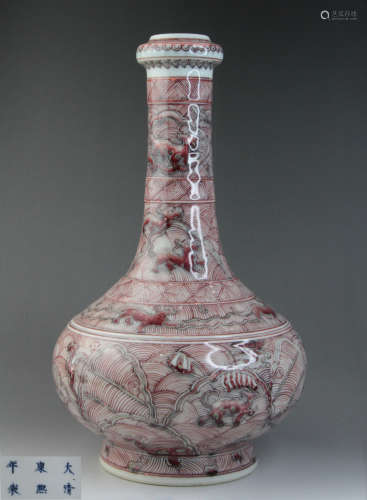 AN UNDERGLAZE RED VASE PAINTED WITH QILIN