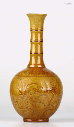 A DING YAO YELLOW GLAZE VASE WITH FLOWER PATTERN