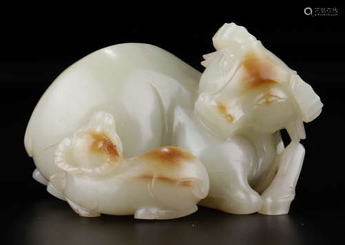 A HETIAN WHITE JADE ORNAMENT SHAPED WITH COW