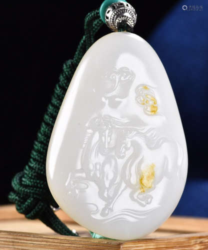 A HETIAN JADE PENDANT CARVED WITH HORSE