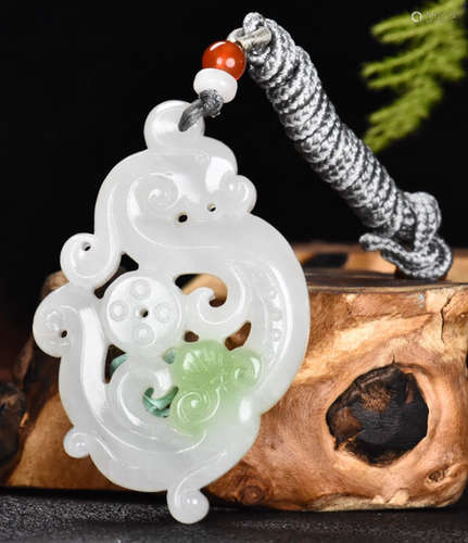 A HETIAN JADE PENDANT SHAPED WITH DRAGON