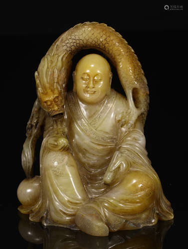 A SHOUSHAN STONE XIANGLONG ARHAT STATUE