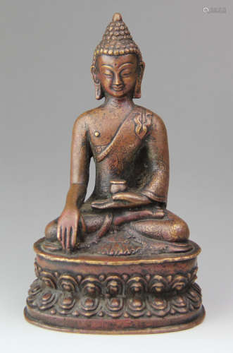 A PURPLE COPPER SAKYAMUNI BUDDHA