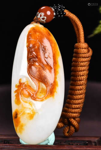 A HETIAN JADE PENDANT CARVED WITH GUANGONG