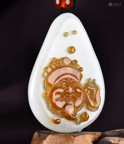 A HETIAN JADE PENDANT CARVED WITH CAISHEN