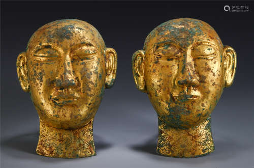 A PAIR OF CHINESE GILT BRONZE MASK