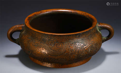 A CHINESE CARVED DRAGON PATTERN DOUBLE HANDLE BRONZE CENSER