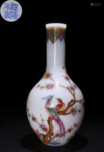 A GLASS VASE WITH BIRD PATTERN