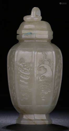 A HETIAN JADE CARVED BUDDHIST PATTERN VASE