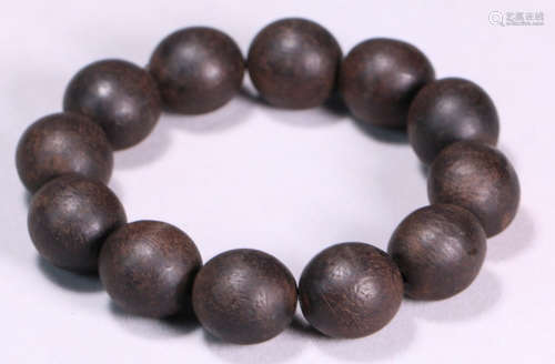 A CHENXIANG WOOD CARVED BRACELET