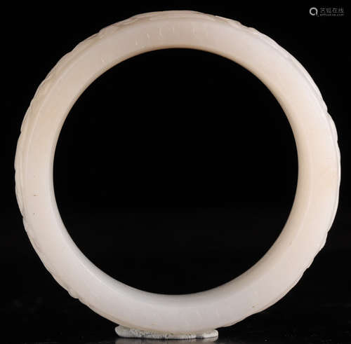 A HETIAN JADE CARVED BANGLE