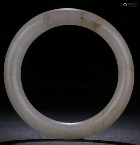 A HETIAN JADE CARVED BANGLE