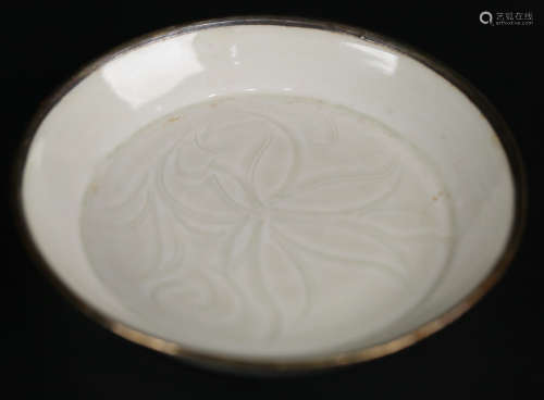 A DING YAO GLAZE WRAPPED SILVER FLORAL PATTERN PLATE