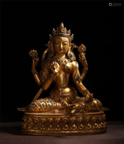 CHINESE GILT BRONZE FOUR ARM SEATED GUANYIN ON LOTUS