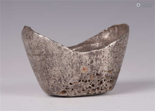 A CHINESE VINTAGE SILVER INGOT