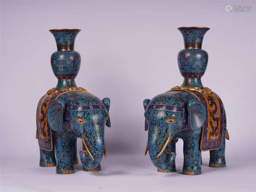 A PAIR OF CHINESE CLOISONNE FLOWER ELEPHANT SHAPED TABLE ITEM