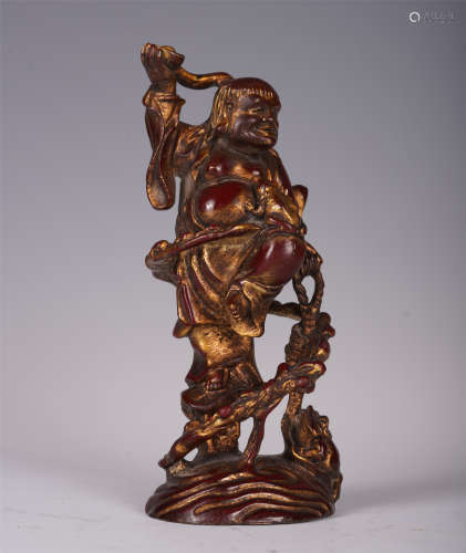 CHINESE BRONZE LACQUER-GILT STAND FIGURE