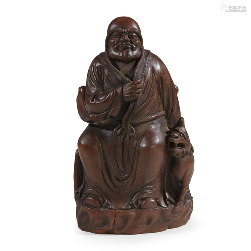 A Chinese carved bamboo shoot figure of a…