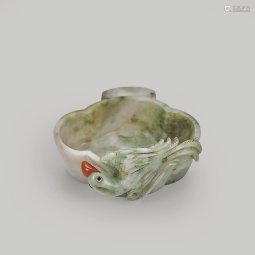 A Chinese carved and embellished jadeite bi…