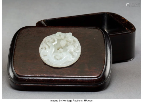 78031: A Chinese White Jade Disk Set in a H…