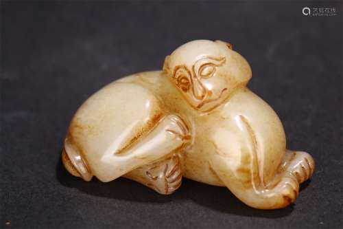 A Chinese Carved Hetian Jade Monkey Ornament