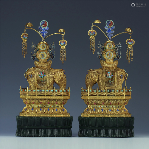 A PAIR OF CHINESE GILT SILVER ELEPHANT SH…