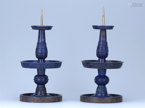 A PAIR OF CHINESE LAPIS CARVED CANDLE H…