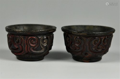 A PAIR OF CHINESE SILVER CARVED LIBATION …