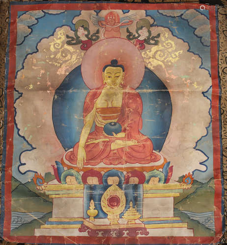 A Tibetan thangka, late Qing dynasty, painted and gilt with a central Buddha seated on a throne,